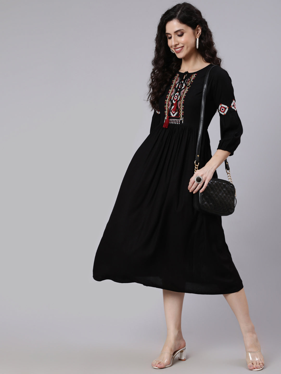 Women Black Solid Embroidered Yoke Design Dress | LASVINI - Redefining Indian Fashion with Elegance