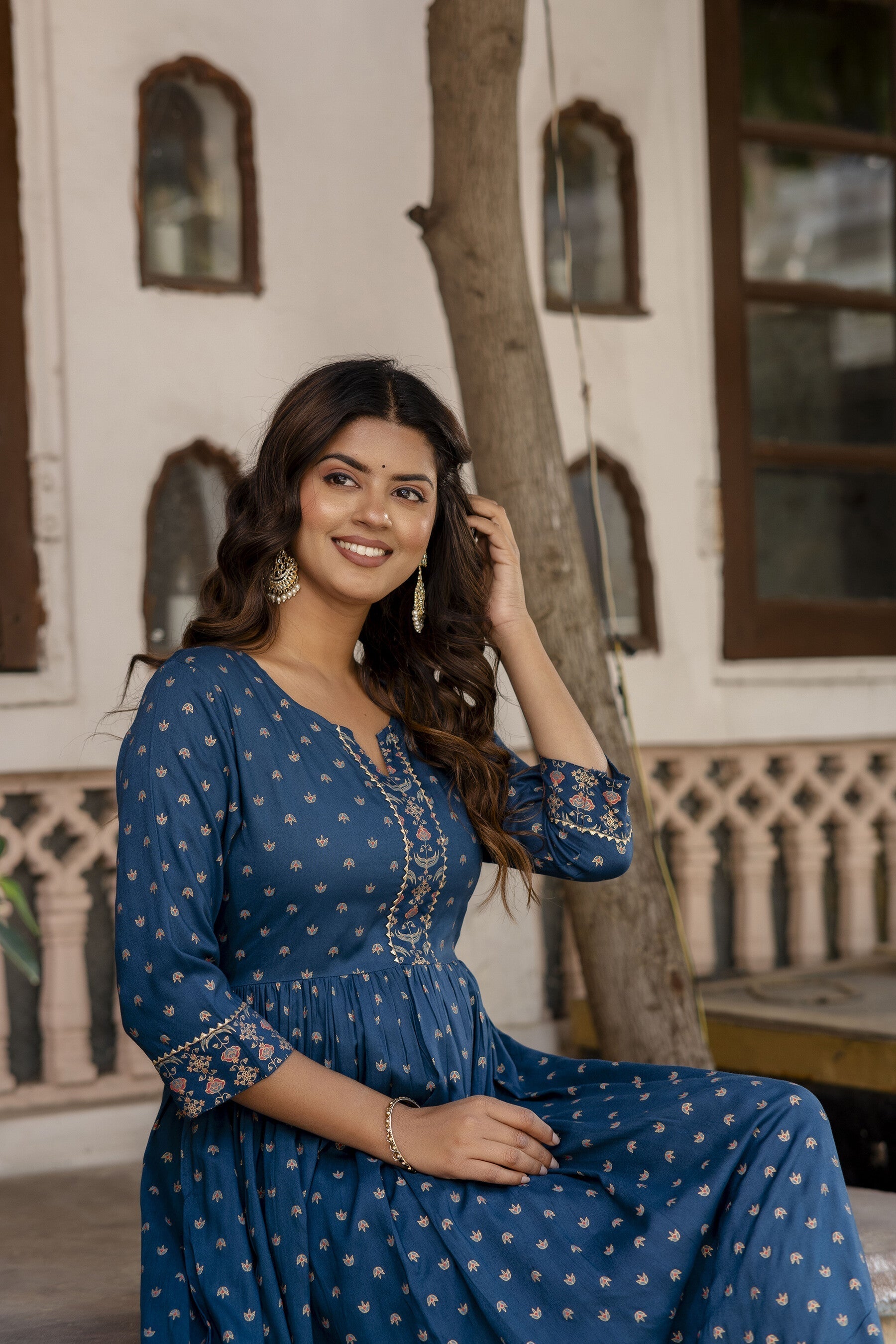Women Teal Blue Ethnic Printed Flared Dress With Three Quarter Sleeves | LASVINI - Redefining Indian Fashion with Elegance