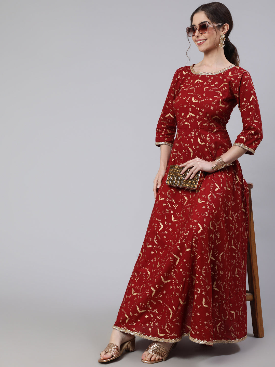Women Maroon Printed Flared Dress With Three Quarter Sleeves | LASVINI - Redefining Indian Fashion with Elegance