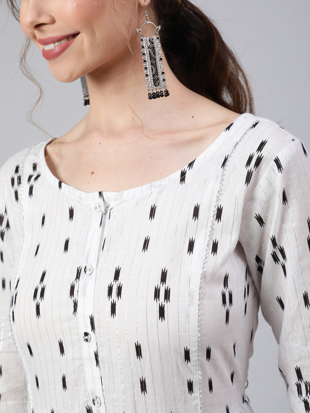 Women Off White Ikat Printed Flared Dress With Three Quarter Sleeves | LASVINI - Redefining Indian Fashion with Elegance