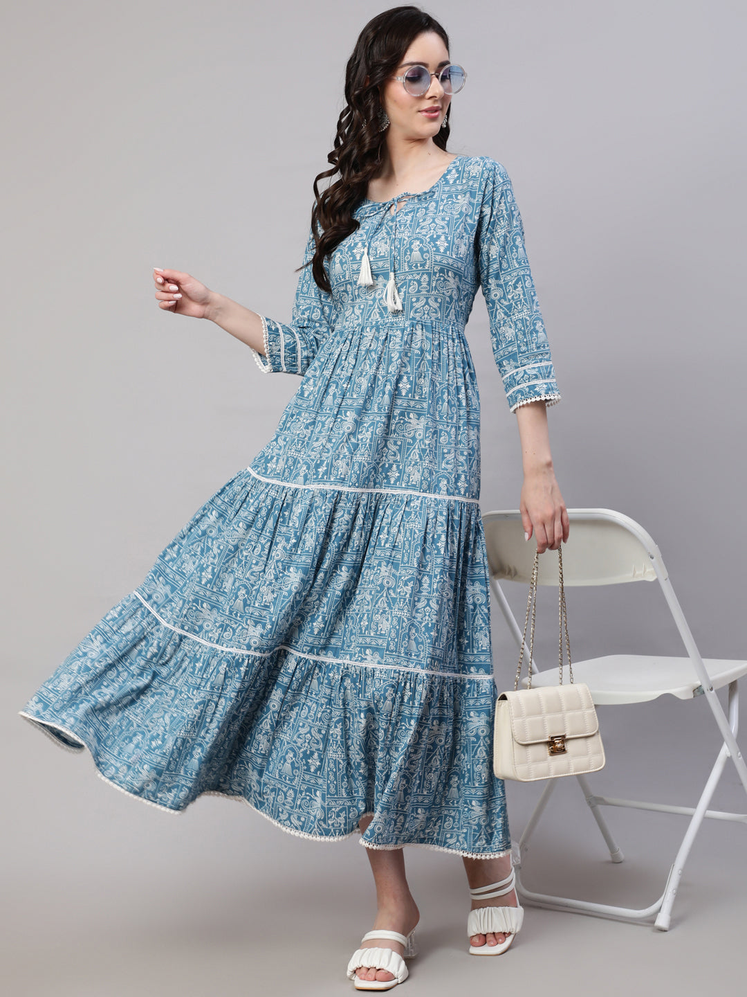 Women Blue Ethnic Printed Tired Dress With Tie Up Neck | LASVINI - Redefining Indian Fashion with Elegance