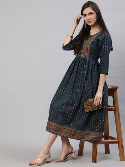 Women Teal Blue Ethnic Printed Flared Dress With Three Quarter Sleeves | LASVINI - Redefining Indian Fashion with Elegance