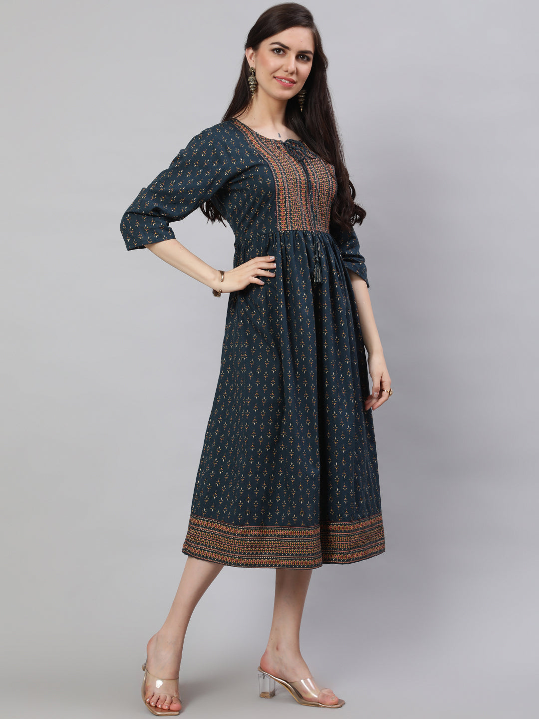 Women Teal Blue Ethnic Printed Flared Dress With Three Quarter Sleeves | LASVINI - Redefining Indian Fashion with Elegance
