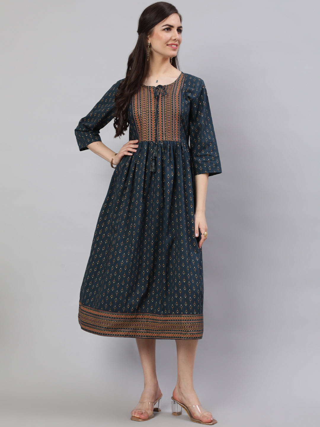 Women Teal Blue Ethnic Printed Flared Dress With Three Quarter Sleeves | LASVINI - Redefining Indian Fashion with Elegance