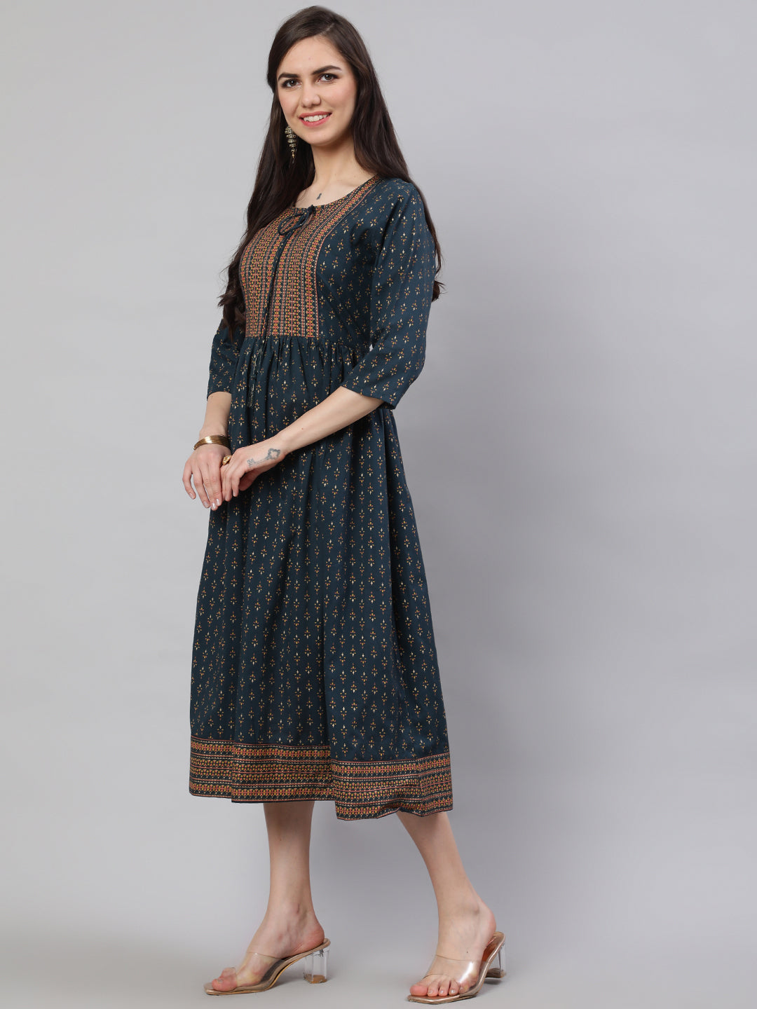 Women Teal Blue Ethnic Printed Flared Dress With Three Quarter Sleeves | LASVINI - Redefining Indian Fashion with Elegance