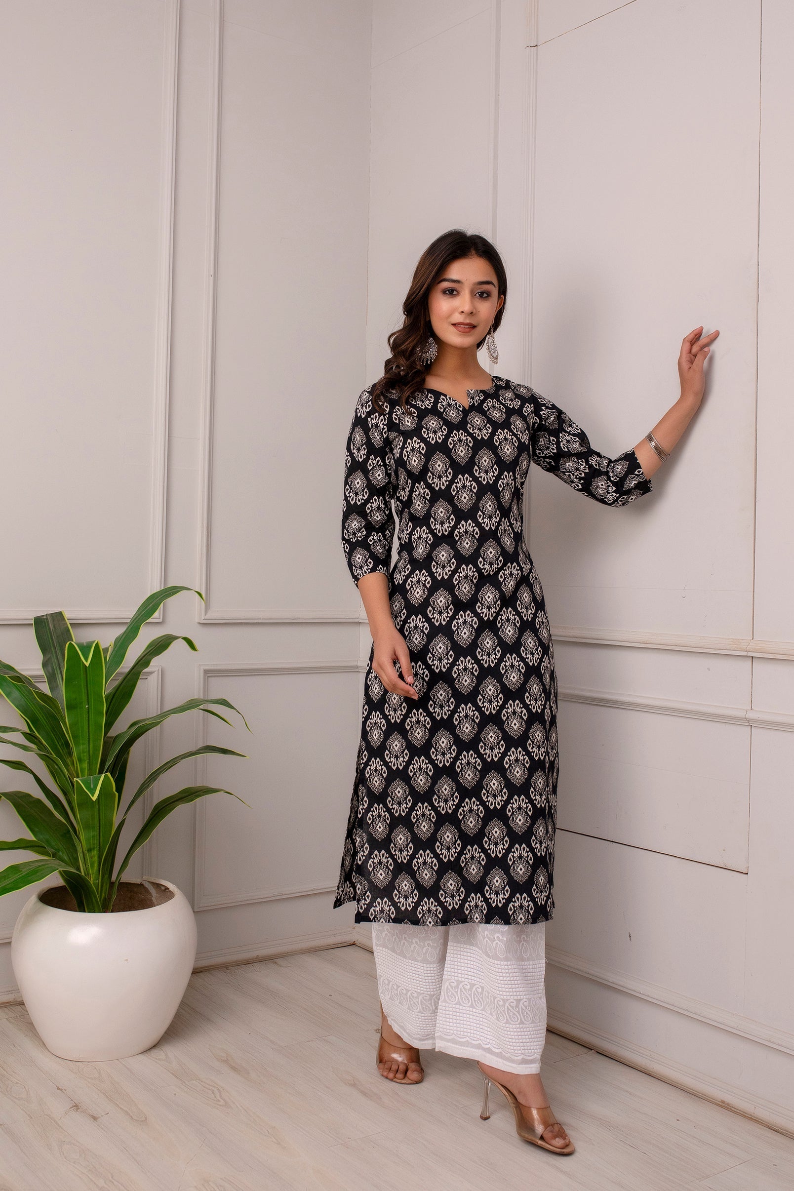 Women Black Printed Straight Kurta With Three Quarter Sleeves | LASVINI - Redefining Indian Fashion with Elegance