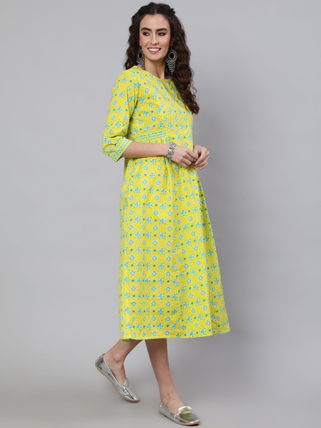 Women Yellow Ethnic Printed Flared Dress With Three Quarter Sleeves | LASVINI - Redefining Indian Fashion with Elegance