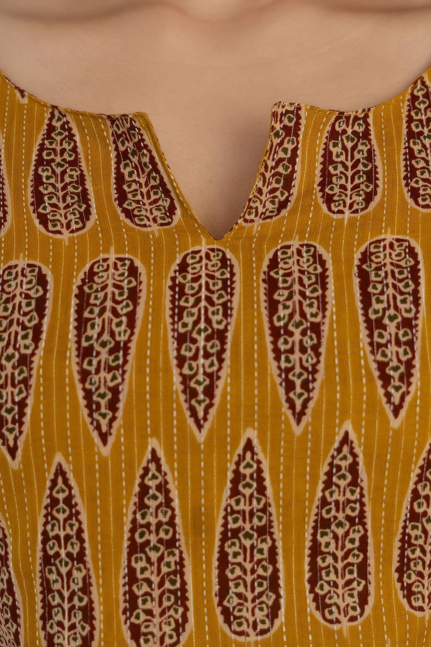 Women Mustard Printed Straight Sleeveless Kurta | LASVINI - Redefining Indian Fashion with Elegance