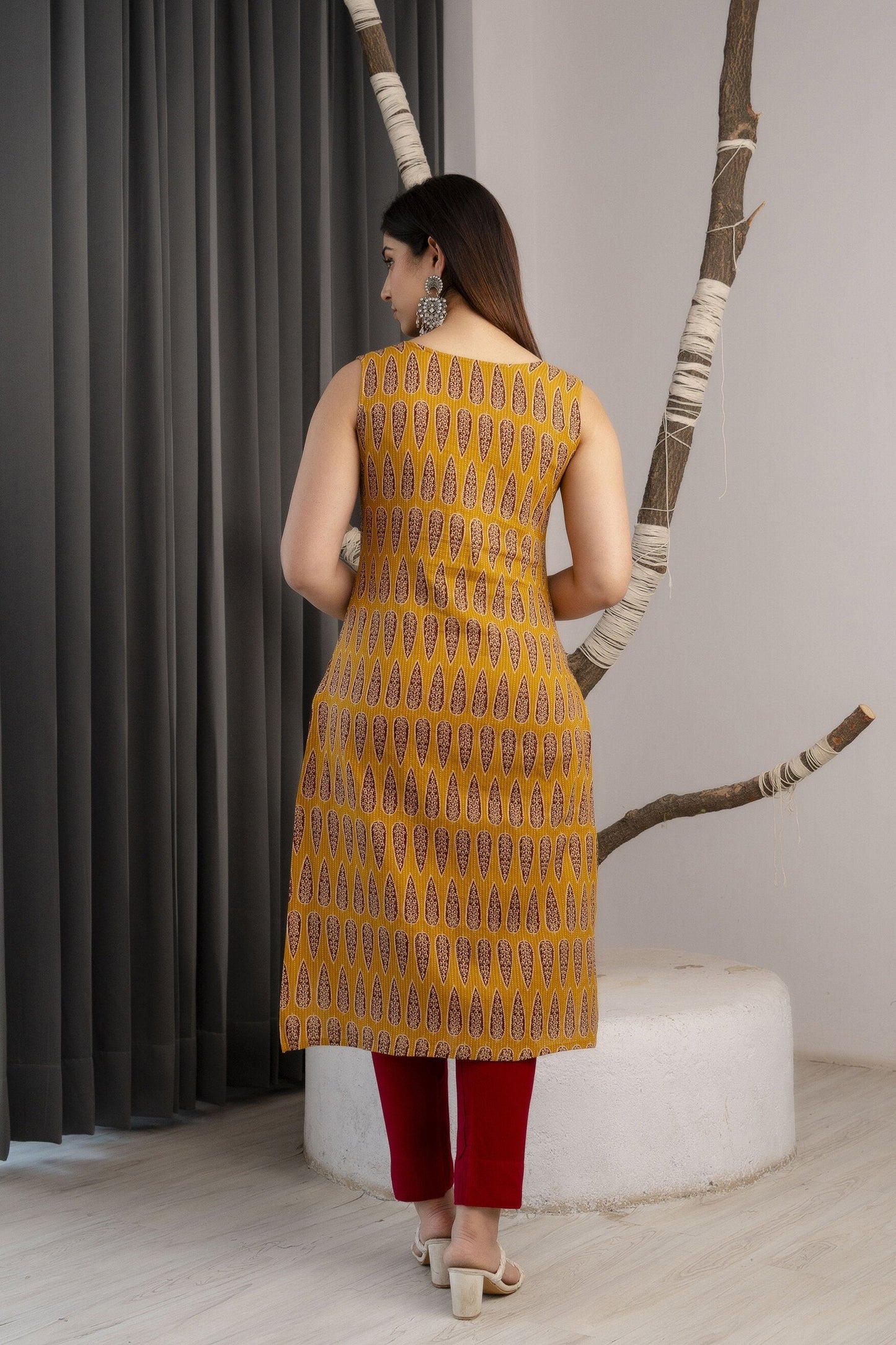 Women Mustard Printed Straight Sleeveless Kurta | LASVINI - Redefining Indian Fashion with Elegance
