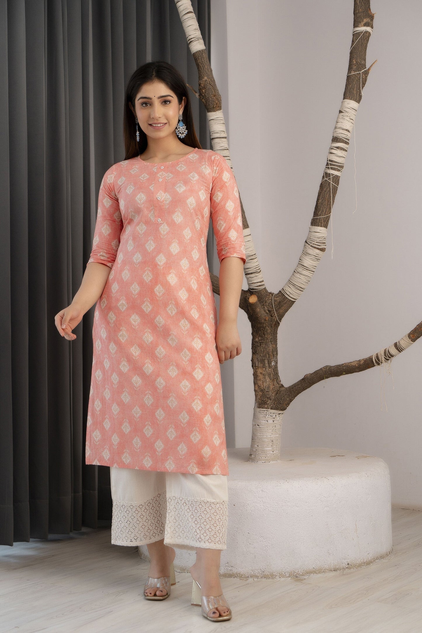 Women Peach Printed Straight Kurta With Three Quarter Sleeves | LASVINI - Redefining Indian Fashion with Elegance