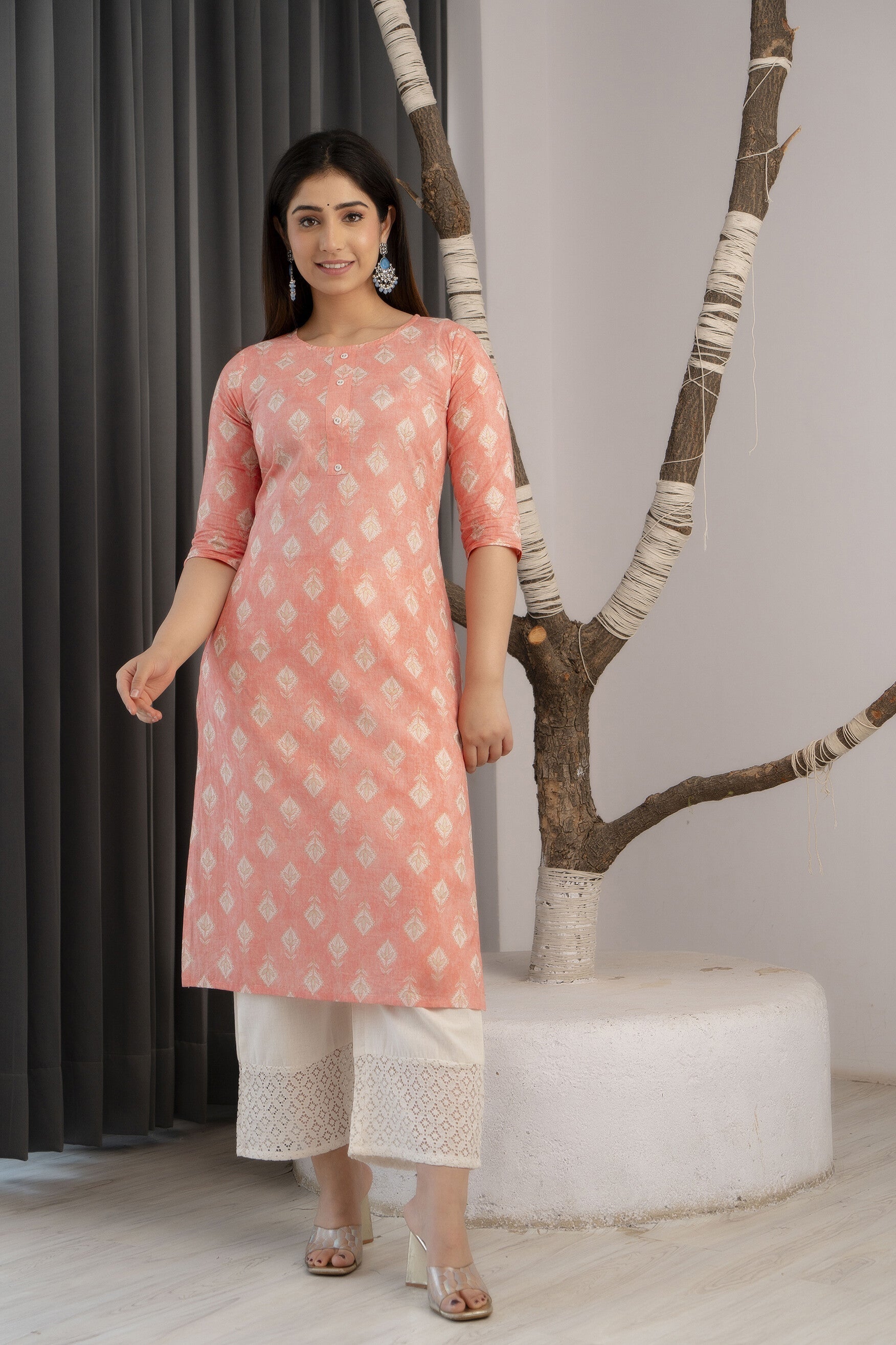 Women Peach Printed Straight Kurta With Three Quarter Sleeves | LASVINI - Redefining Indian Fashion with Elegance