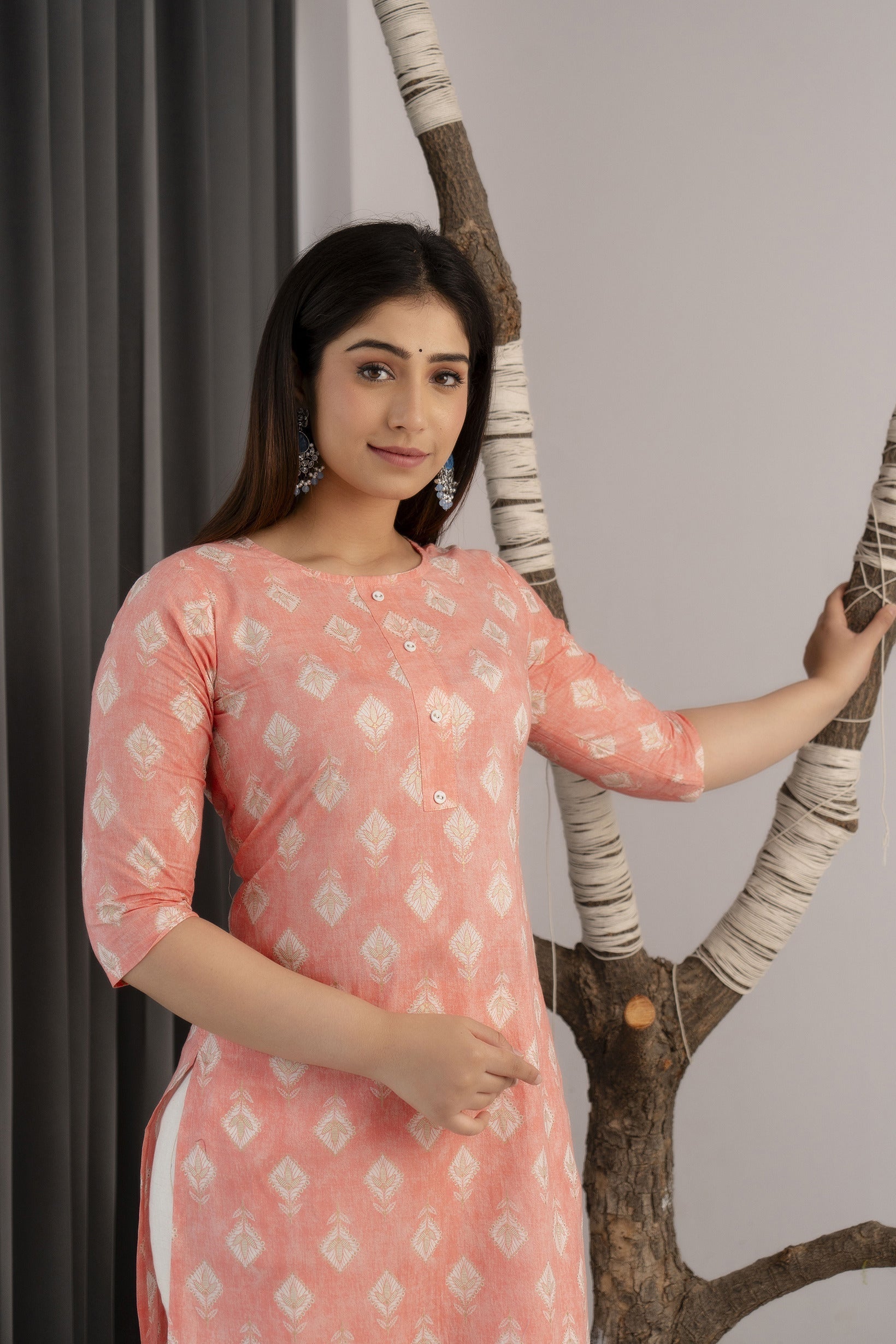Women Peach Printed Straight Kurta With Three Quarter Sleeves | LASVINI - Redefining Indian Fashion with Elegance