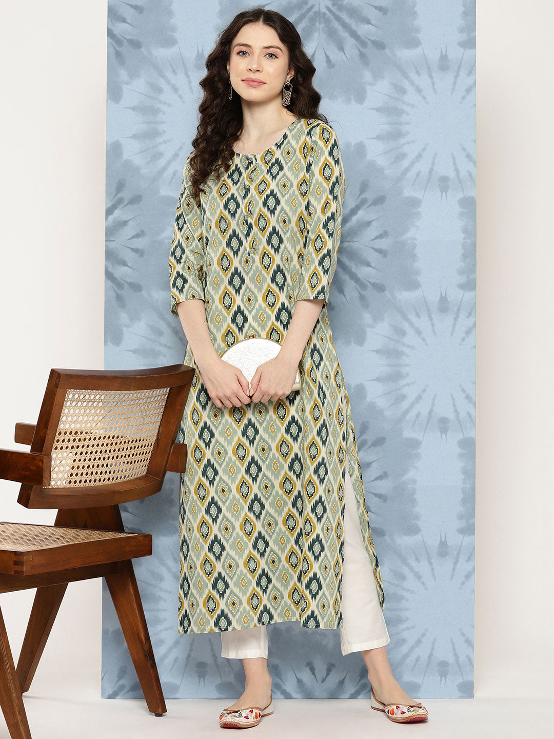 Women Multi Ikat Printed Straight Kurta With Three Quarter Sleeves | LASVINI - Redefining Indian Fashion with Elegance