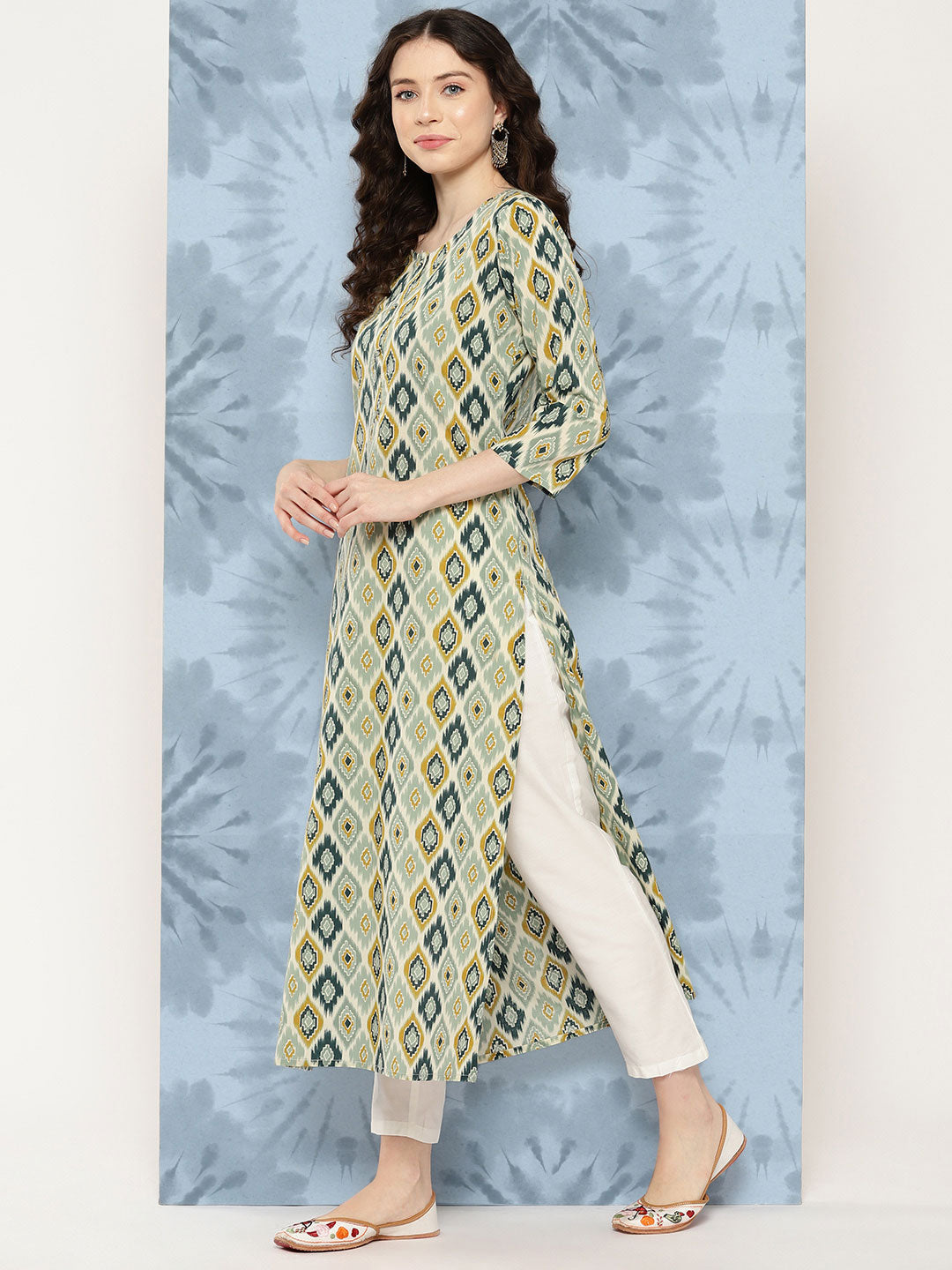 Women Multi Ikat Printed Straight Kurta With Three Quarter Sleeves | LASVINI - Redefining Indian Fashion with Elegance