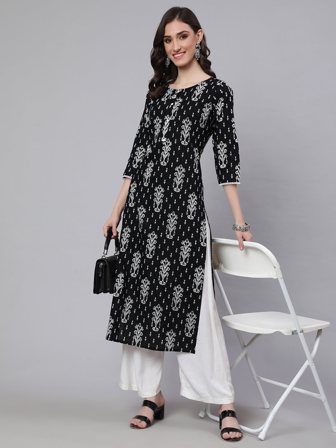 Women Black Printed Straight Kurta With Three Quarter Sleeves | LASVINI - Redefining Indian Fashion with Elegance