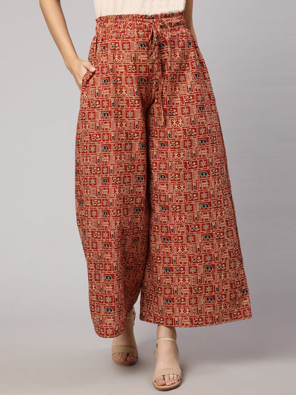 Women Rust Printed Wide Legged Printed Palazzo With Side Pockets | LASVINI - Redefining Indian Fashion with Elegance