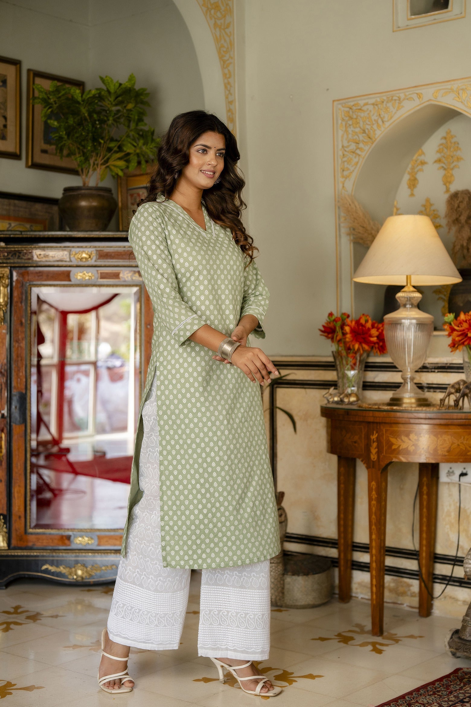 Women Green Ethnic Printed Straight Kurta With Three Quarter Sleeves | LASVINI - Redefining Indian Fashion with Elegance