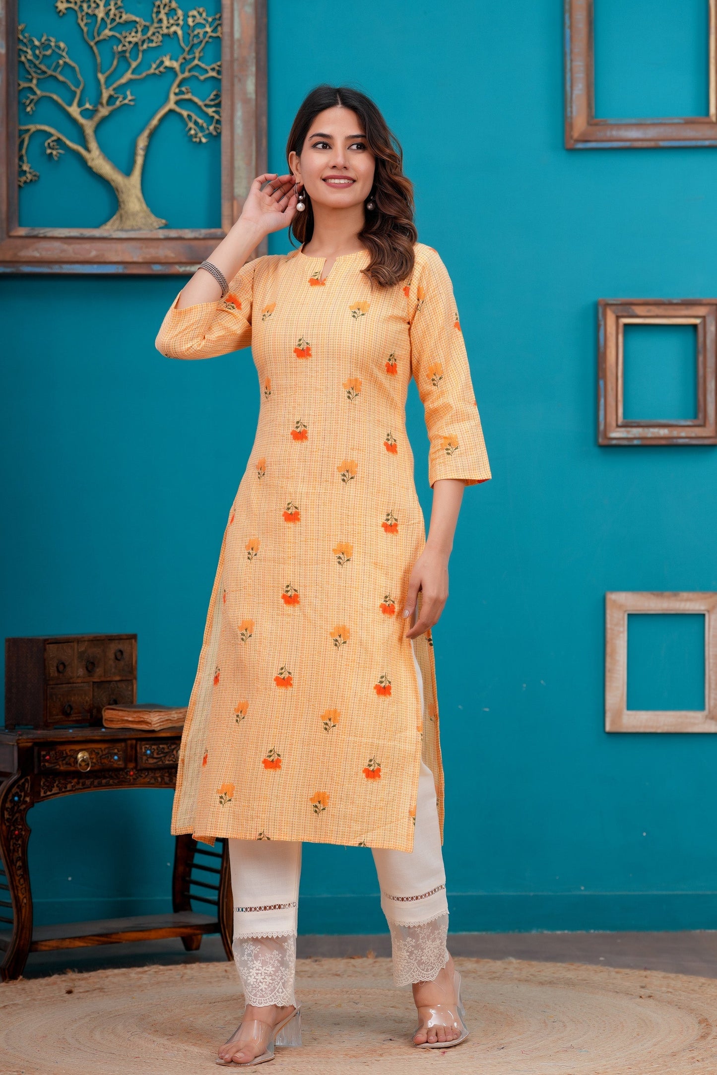 Women Orange Printed Straight Kurta with Three quarter sleeve | LASVINI - Redefining Indian Fashion with Elegance