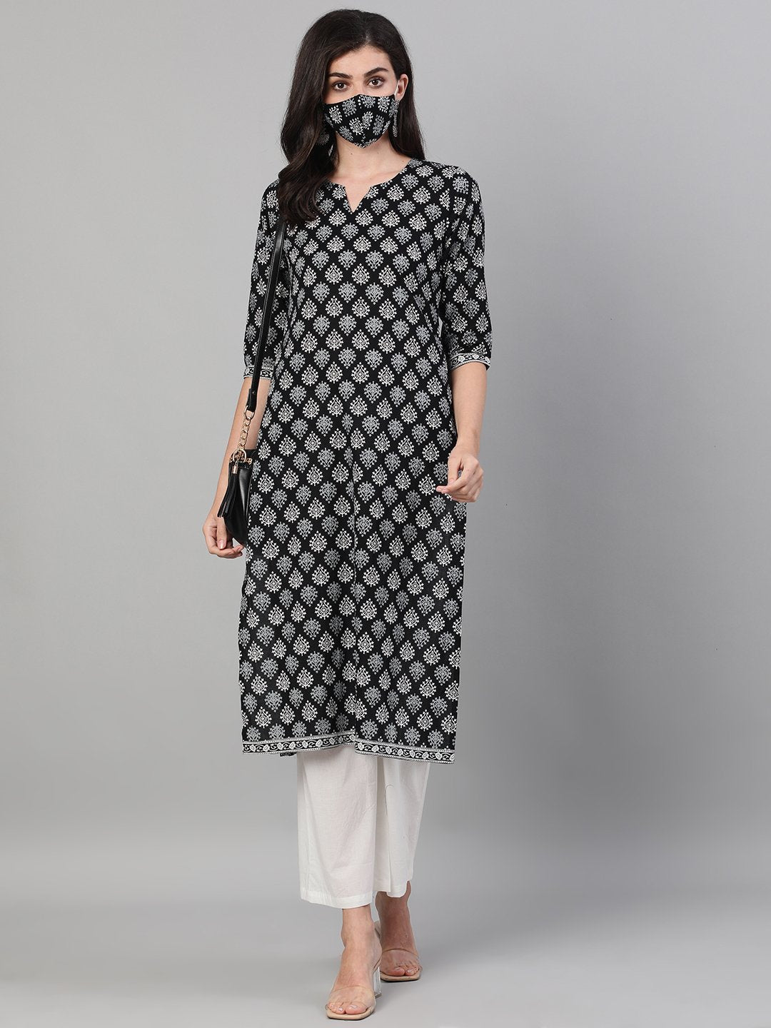 Women Black Three-Quarter Sleeves Straight Kurta With Palazzo And Pockets And Face Mask | LASVINI - Redefining Indian Fashion with Elegance