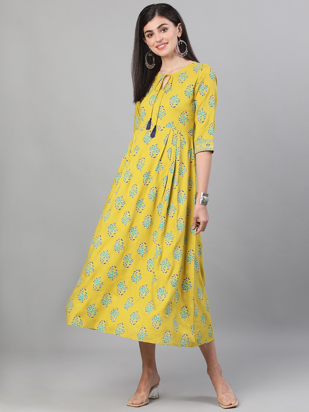Women Green Printed Round Neck Viscose Rayon Fit And Flare Dress With Pockets | LASVINI - Redefining Indian Fashion with Elegance