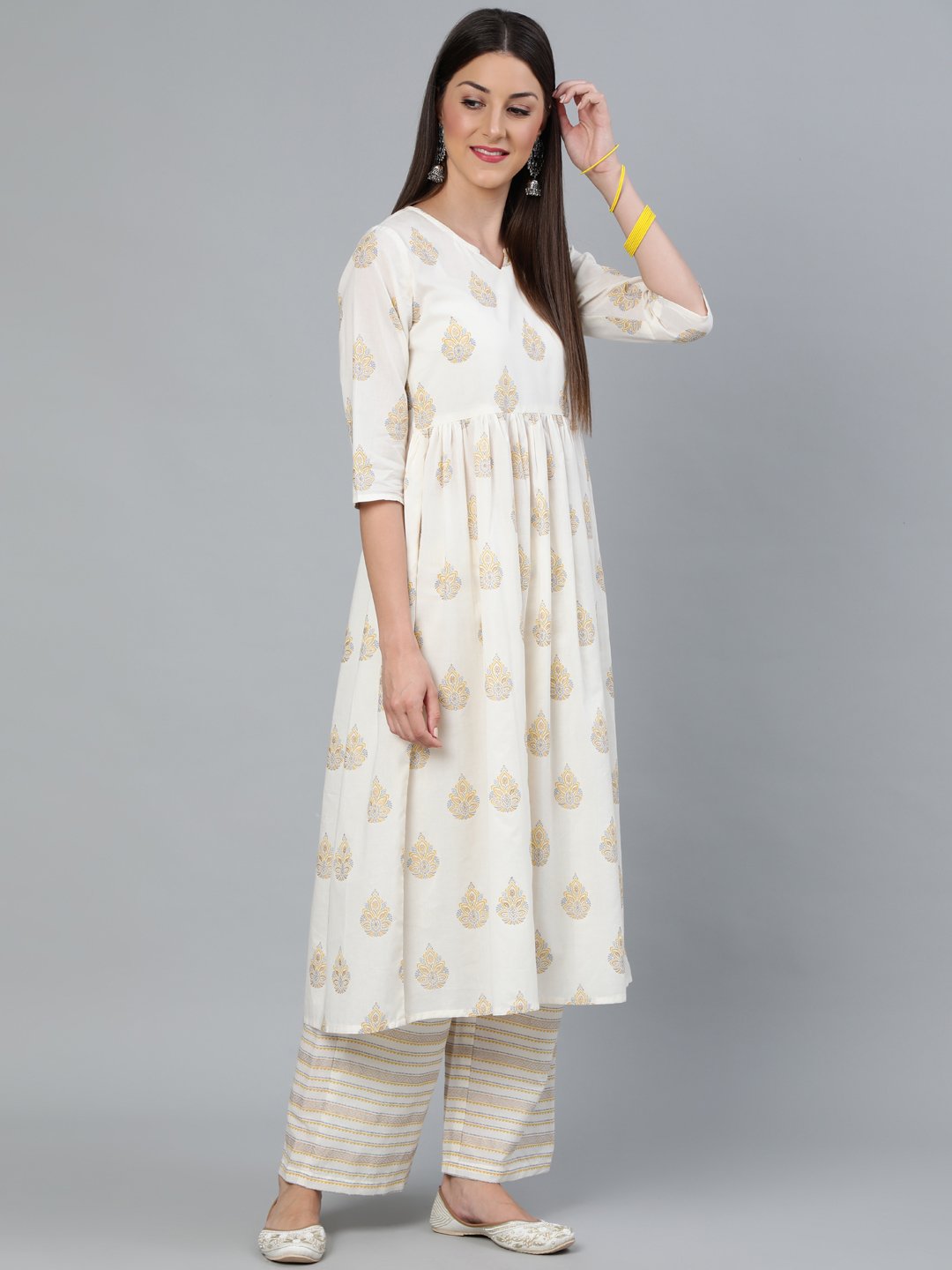 Women Cream & Gold Printed Gathered  Kurta With Plazzo | LASVINI - Redefining Indian Fashion with Elegance