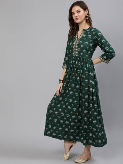 Women Green & Gold Printed Maxi Dress With Three Quarter Sleeves | LASVINI - Redefining Indian Fashion with Elegance