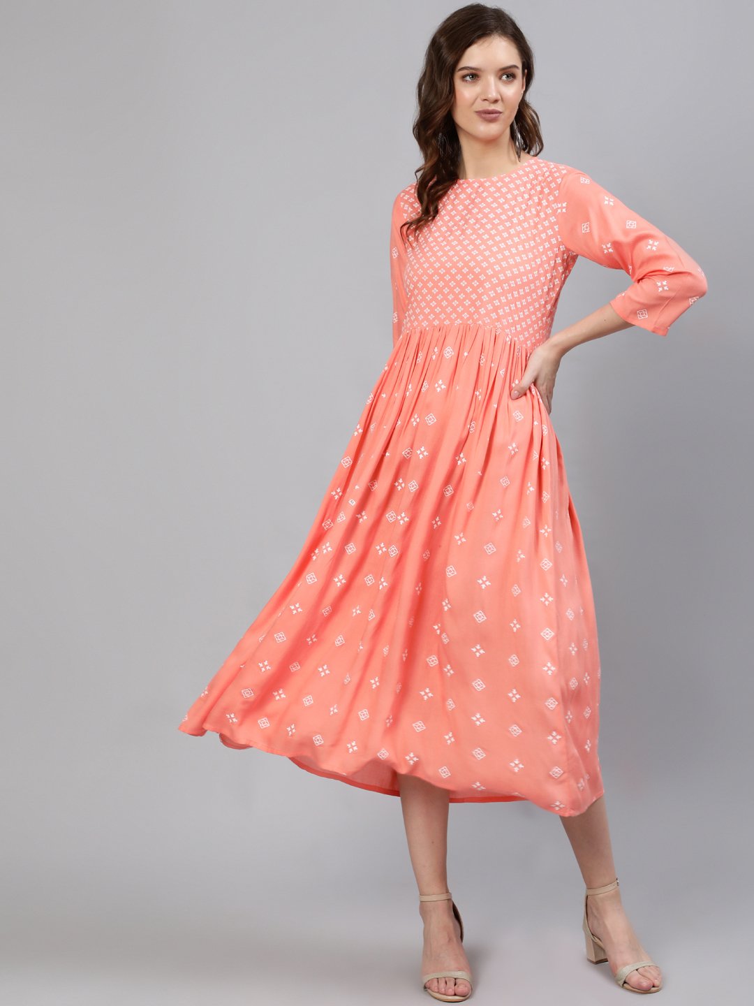 Women Peach Printed Dress With Three Quarter Sleeves | LASVINI - Redefining Indian Fashion with Elegance