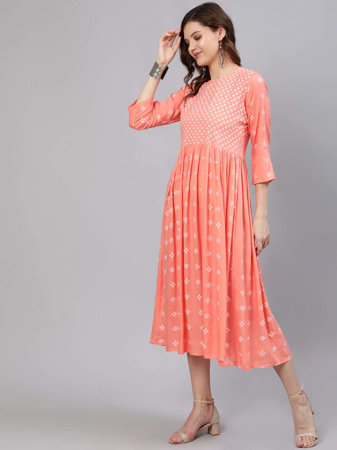 Women Peach Printed Dress With Three Quarter Sleeves | LASVINI - Redefining Indian Fashion with Elegance