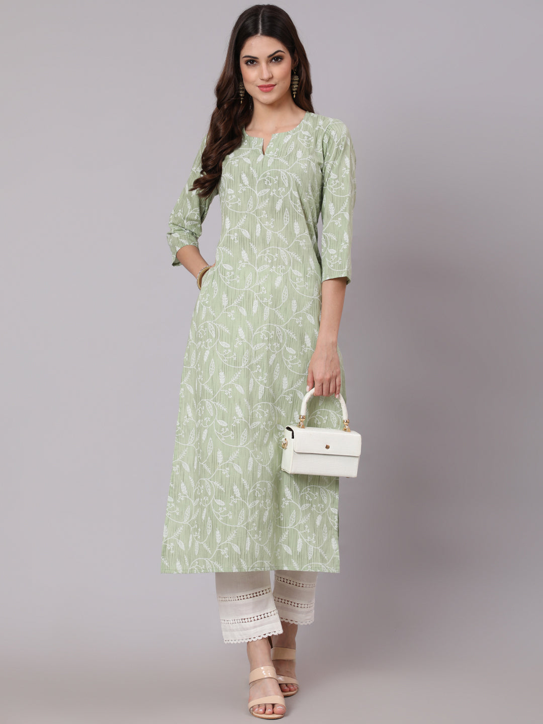 Women Green Printed Straight Kurta And White Solid Palazzo With Lace Detail | LASVINI - Redefining Indian Fashion with Elegance