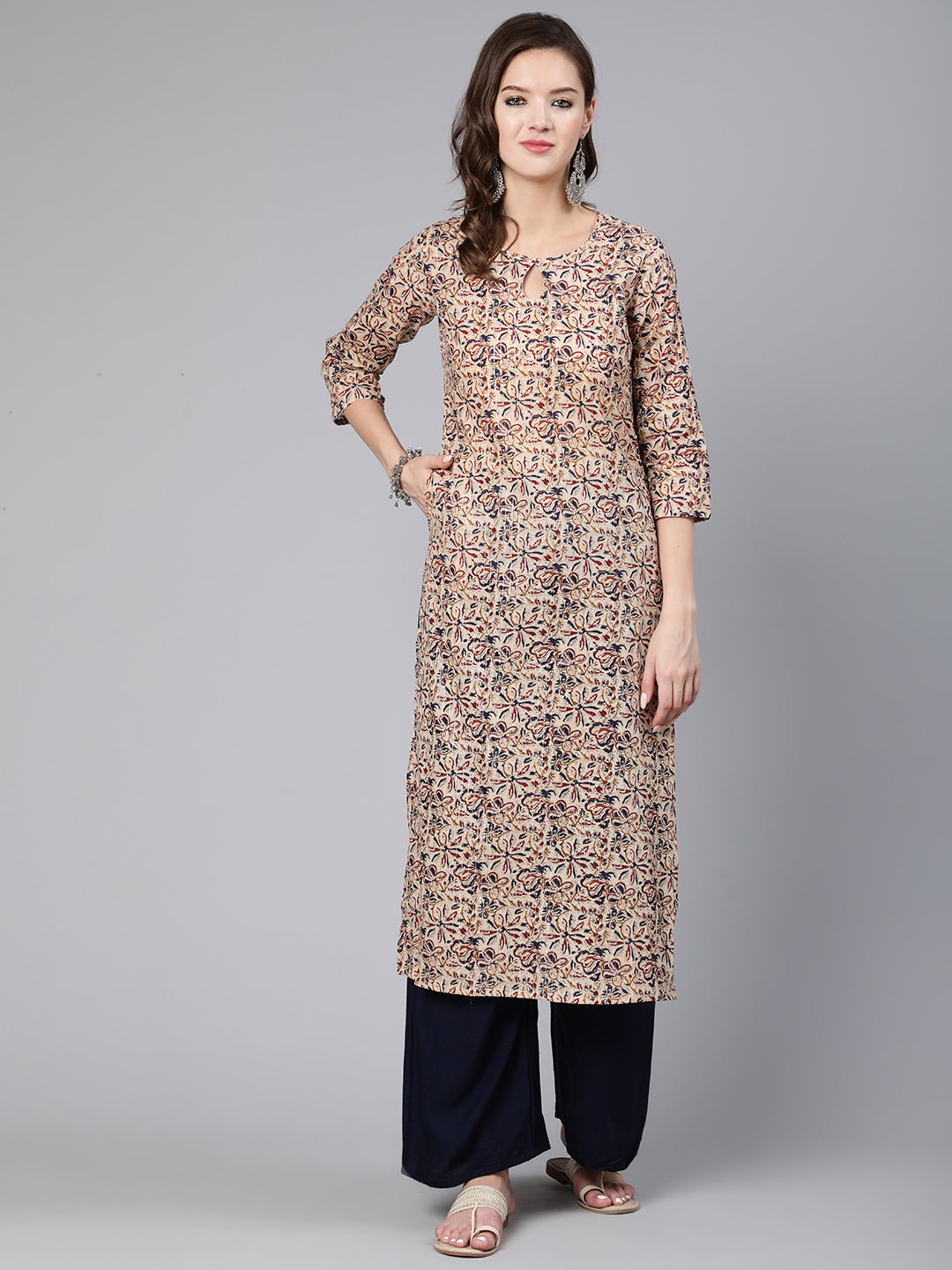 Women Cream Abstract Printed Straight Kurta With Key Hole Neck | LASVINI - Redefining Indian Fashion with Elegance