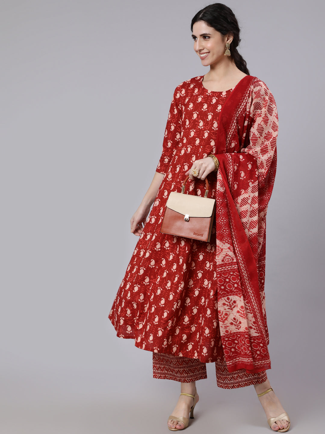 Women Rust Ethnic Printed Flared Kurta With Palazzo And Dupatta | LASVINI - Redefining Indian Fashion with Elegance