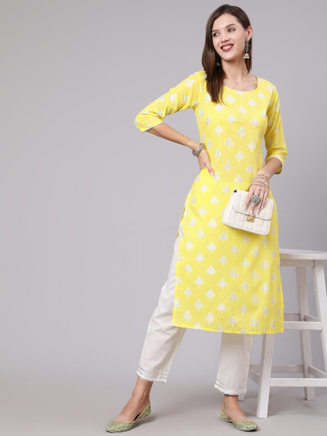 Women Yellow Printed Straight Kurta With Solid White Palazzo | LASVINI - Redefining Indian Fashion with Elegance