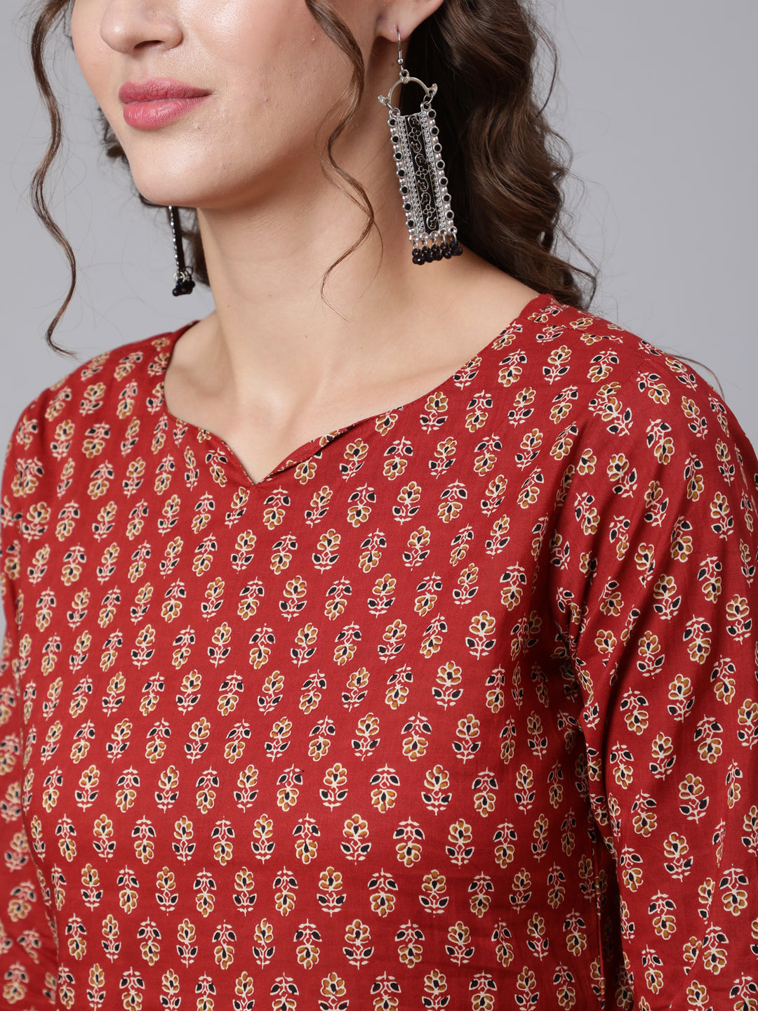 Women Maroon Ethnic Printed Straight Kurta With Three Quarter Sleeves | LASVINI - Redefining Indian Fashion with Elegance