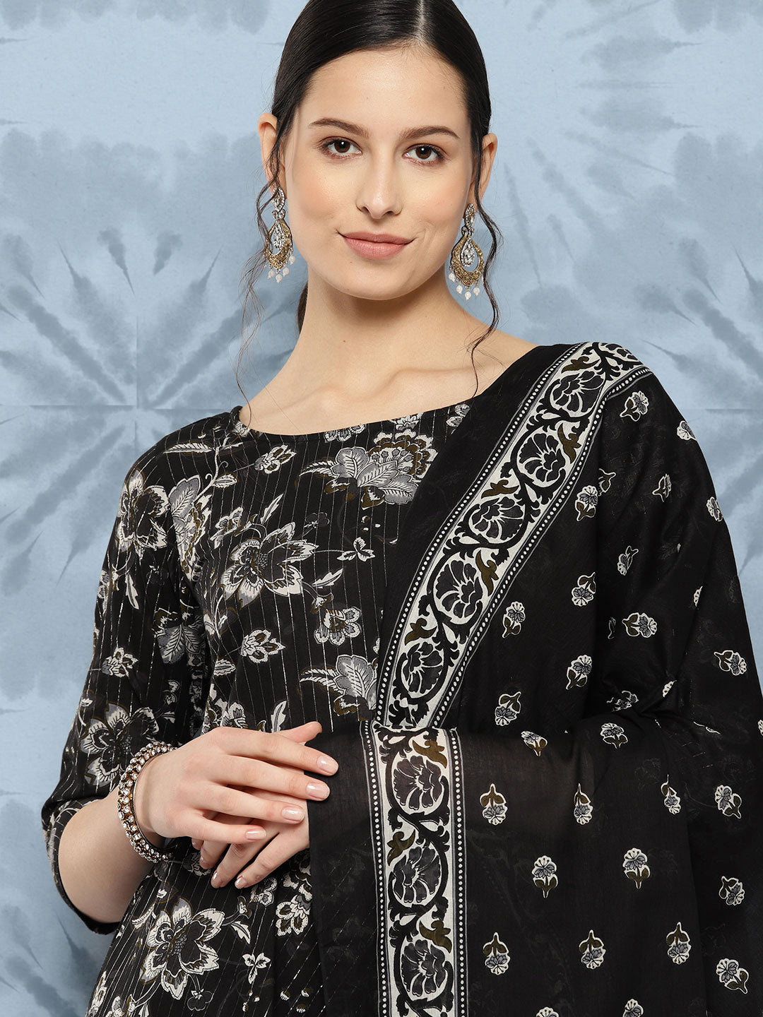 Women Black Floral Printed Flared Kurta With Trouser And Dupatta | LASVINI - Redefining Indian Fashion with Elegance