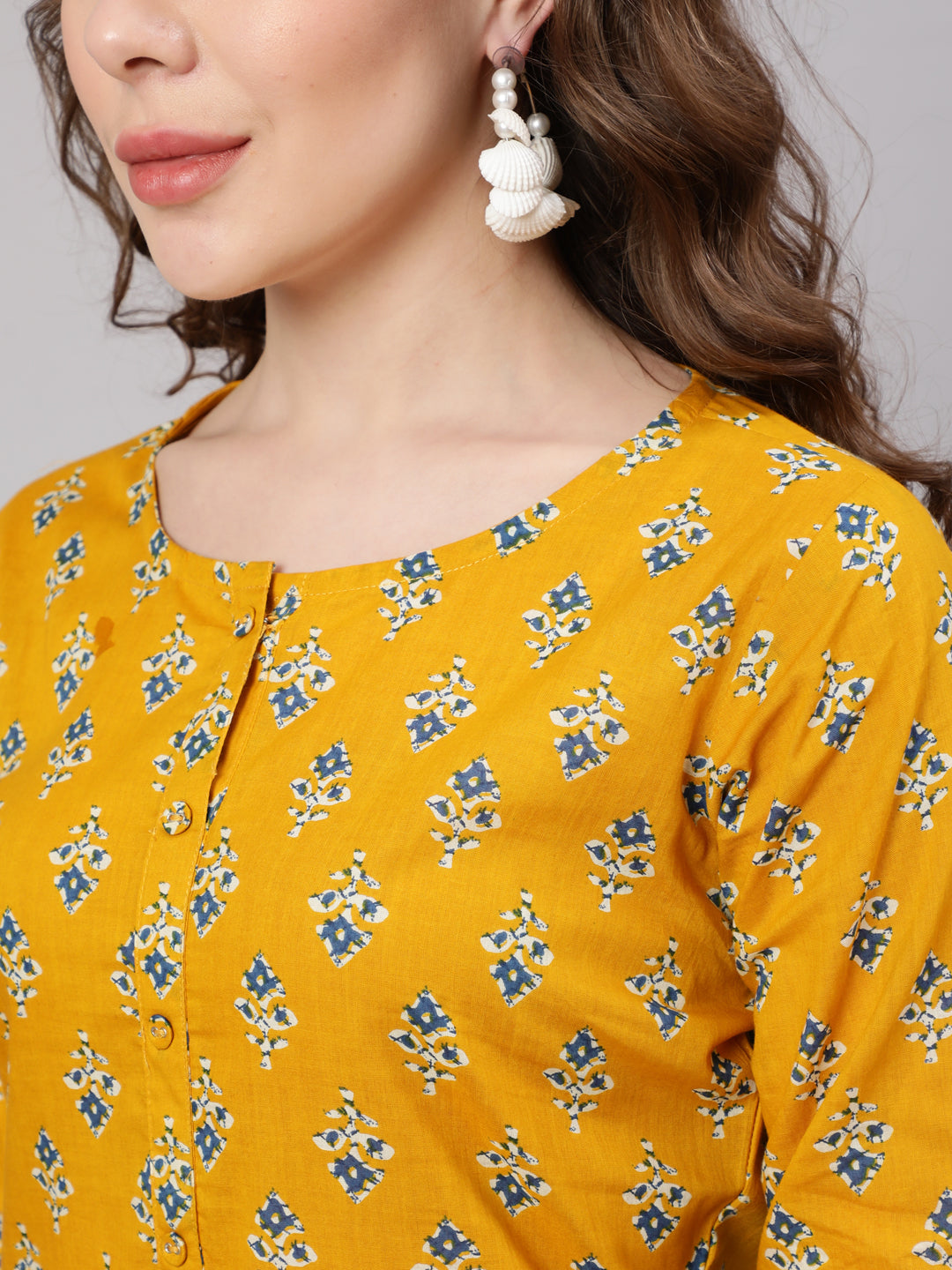Women Mustard Printed Straight Kurta With Trouser | LASVINI - Redefining Indian Fashion with Elegance