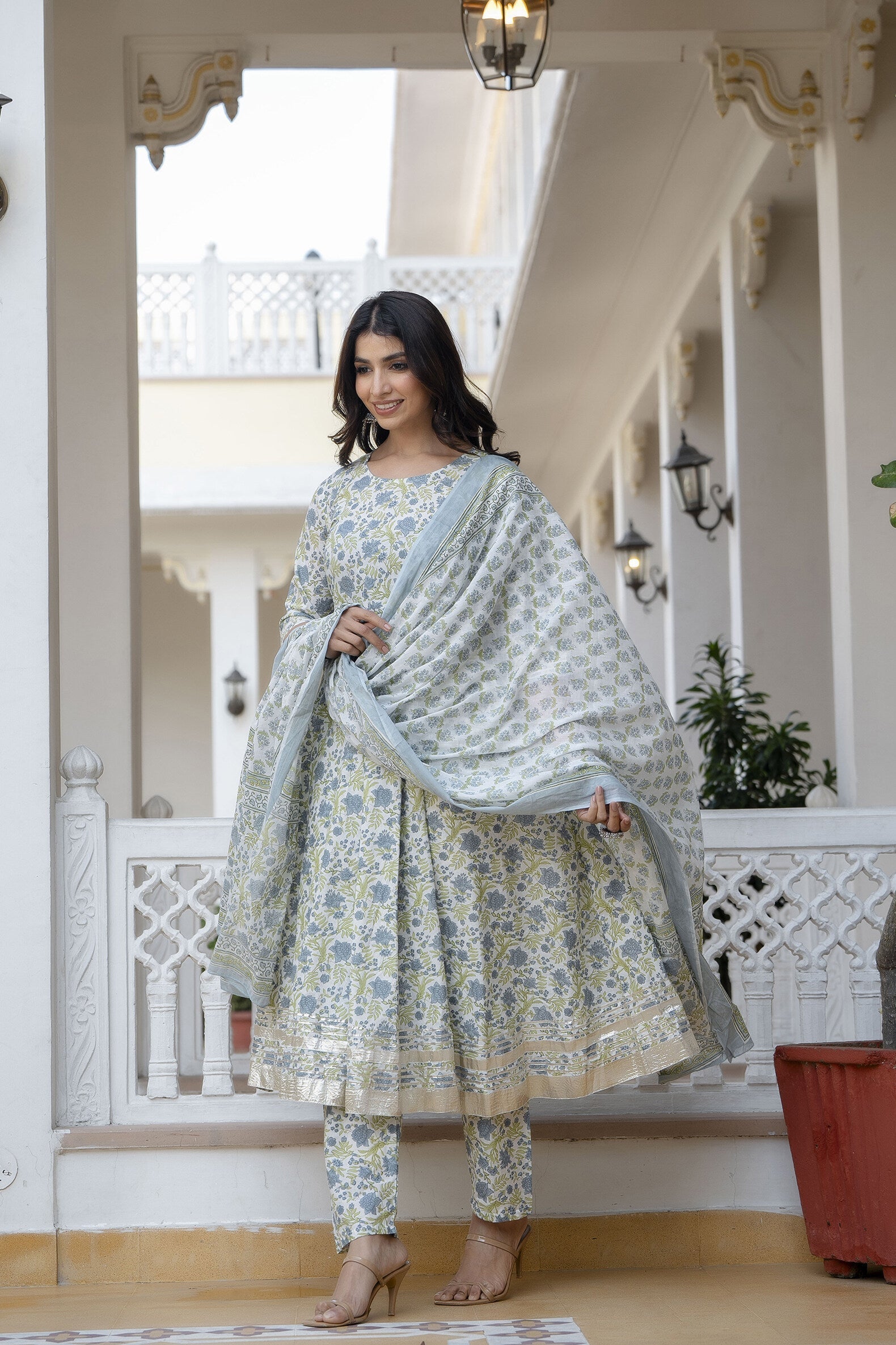 Women Off-White Floral Printed Flared Kurta With Trouser And Dupatta | LASVINI - Redefining Indian Fashion with Elegance