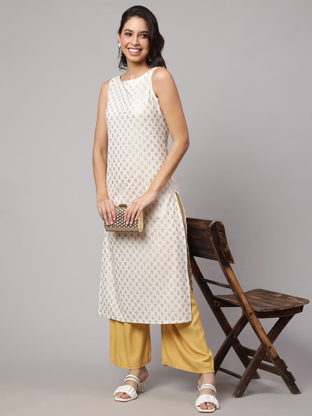 Women White Gold Printed Straight Sleeveless Kurta | LASVINI - Redefining Indian Fashion with Elegance