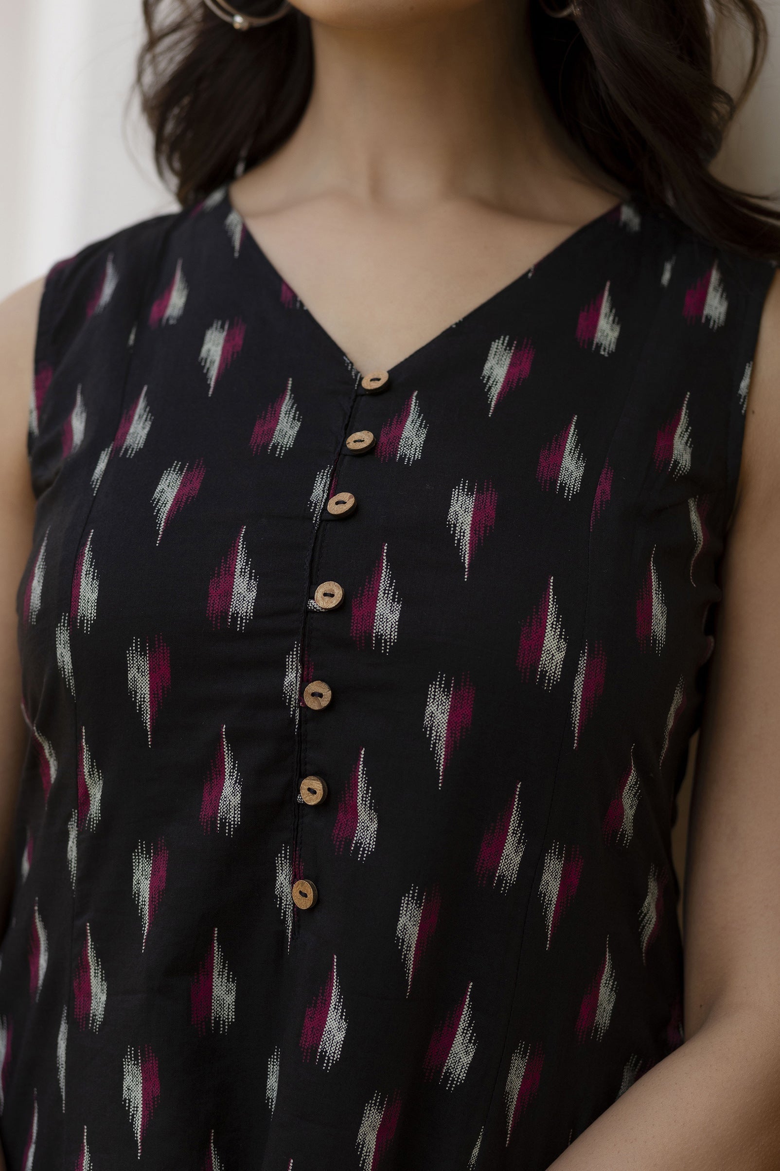 Women Black Ikat Printed Sleeveless A-Line Dress | LASVINI - Redefining Indian Fashion with Elegance