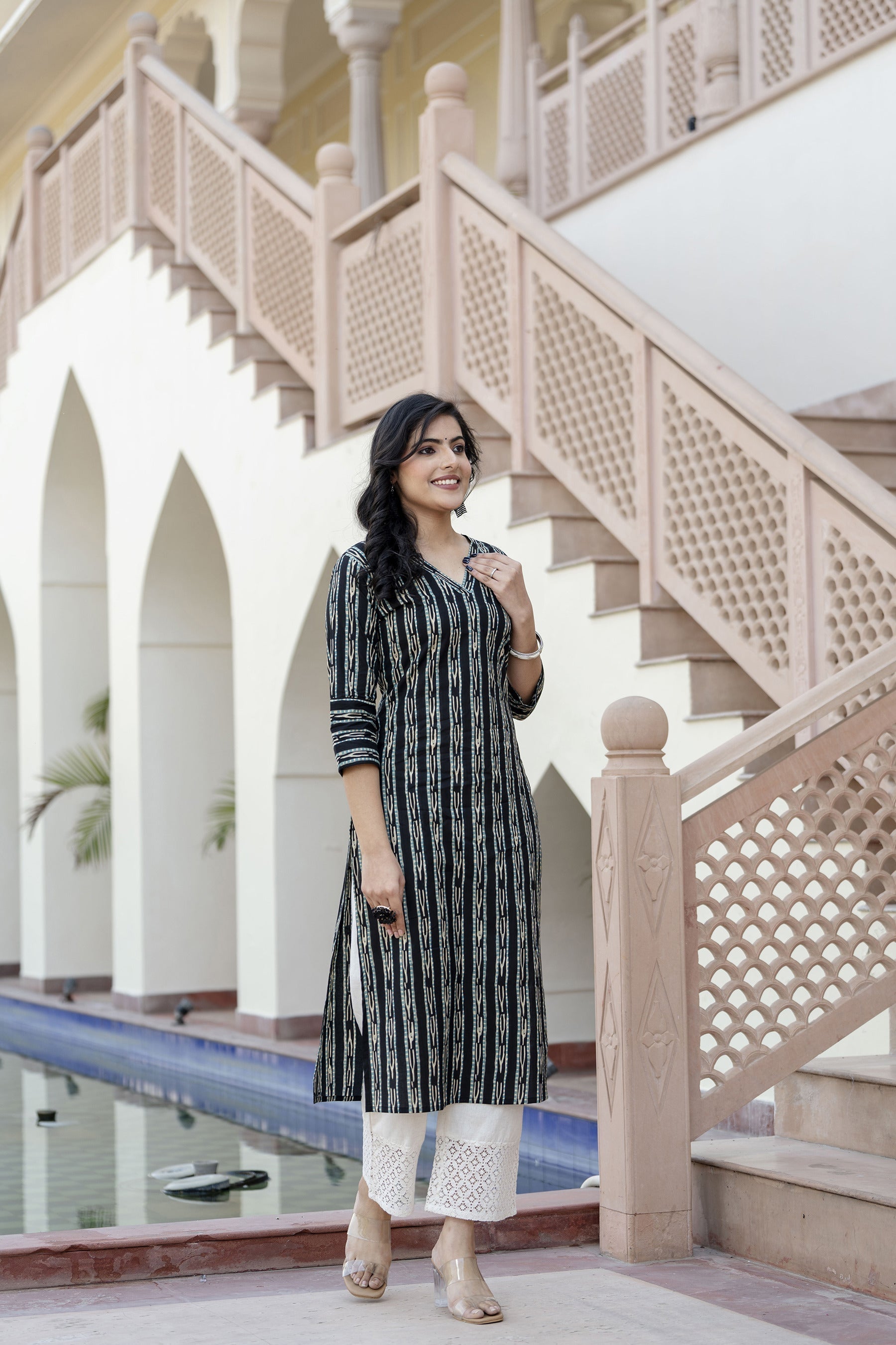 Women Black Ikat Printed Straight V-Neck Kurta | LASVINI - Redefining Indian Fashion with Elegance