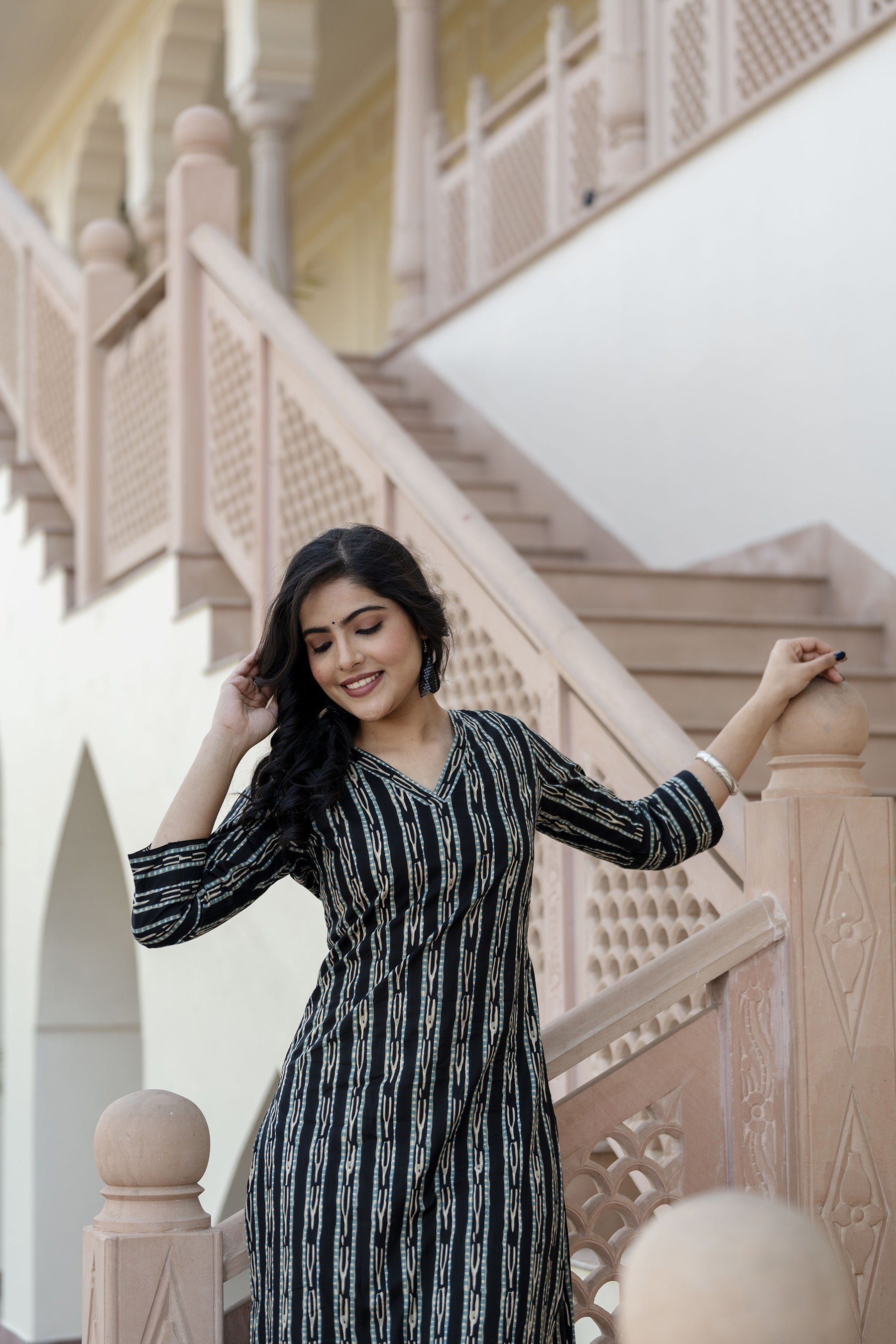 Women Black Ikat Printed Straight V-Neck Kurta | LASVINI - Redefining Indian Fashion with Elegance