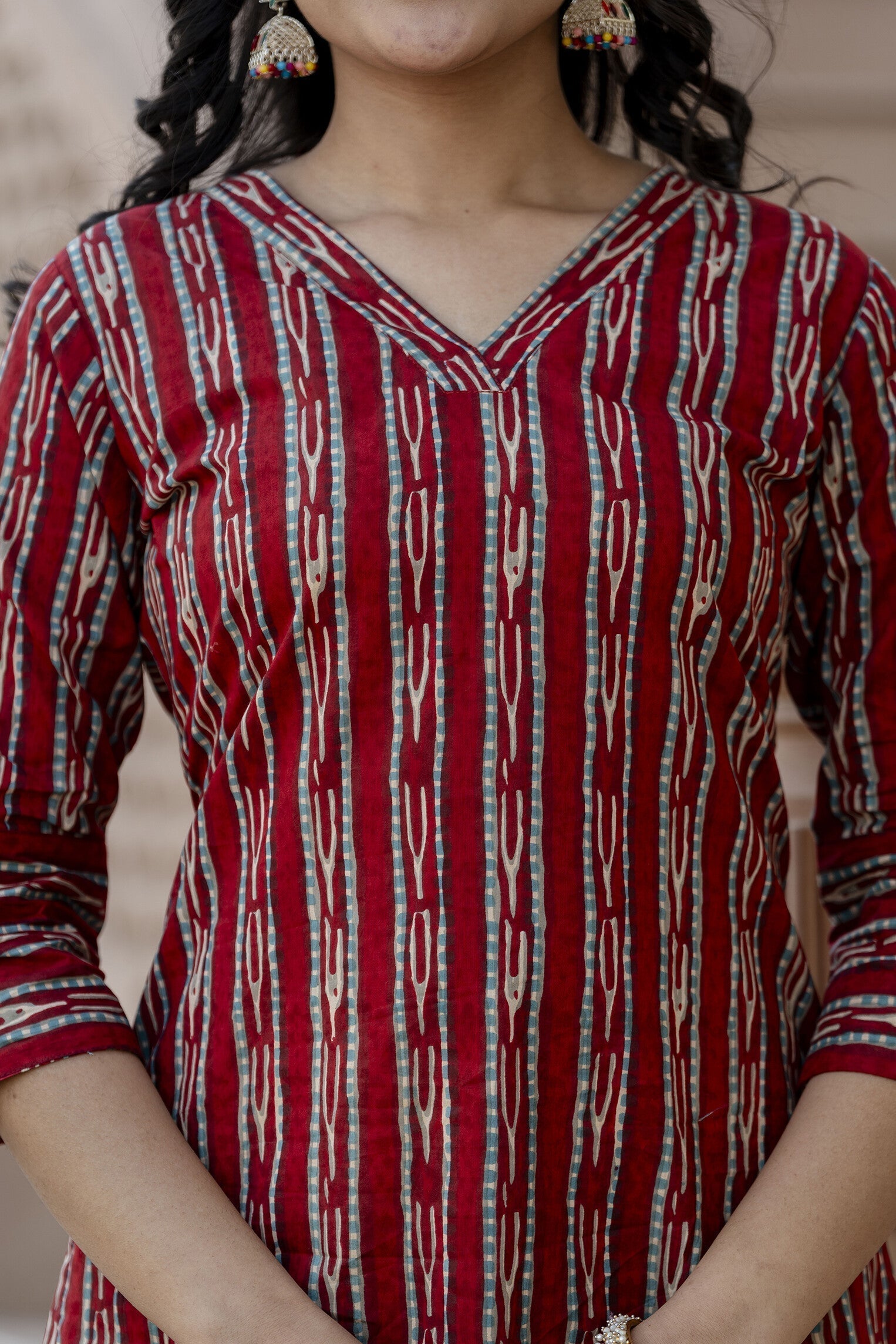 Women Maroon Ikat Printed Straight V-Neck Kurta | LASVINI - Redefining Indian Fashion with Elegance