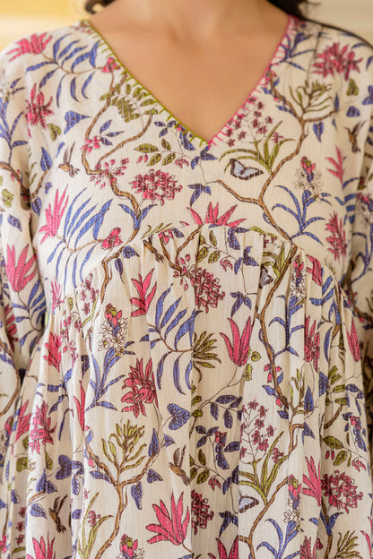 Women Off White Printed V-Neck Peplum Tunic | LASVINI - Redefining Indian Fashion with Elegance