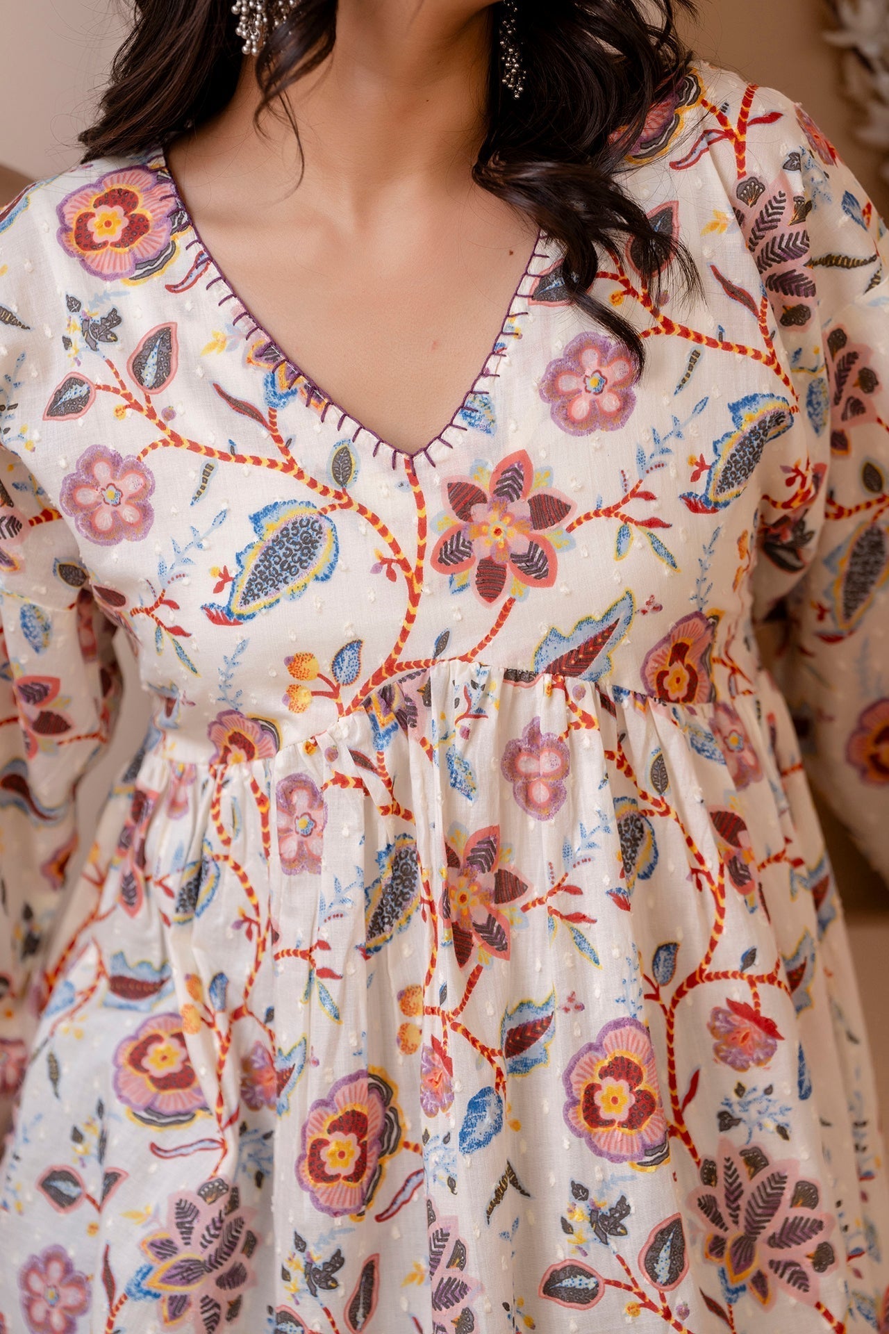 Women Off White Printed V-Neck Peplum Tunic | LASVINI - Redefining Indian Fashion with Elegance