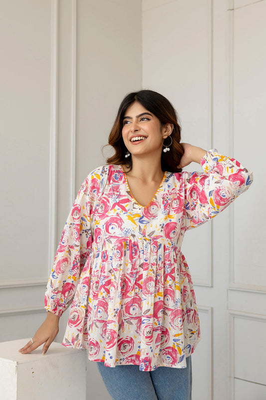 Women Pink And Off-White Printed V-Neck Peplum Tunic | LASVINI - Redefining Indian Fashion with Elegance