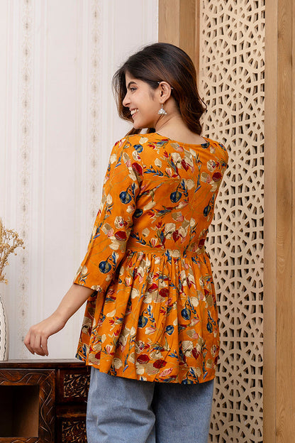 Women Mustard Printed V-Neck Peplum Tunic | LASVINI - Redefining Indian Fashion with Elegance
