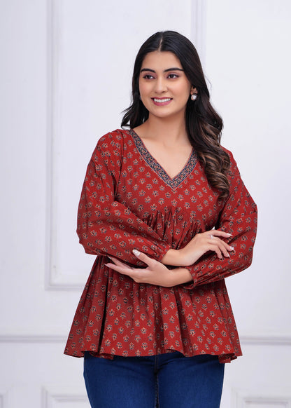 Women Maroon Printed Peplum Tunic | LASVINI - Redefining Indian Fashion with Elegance