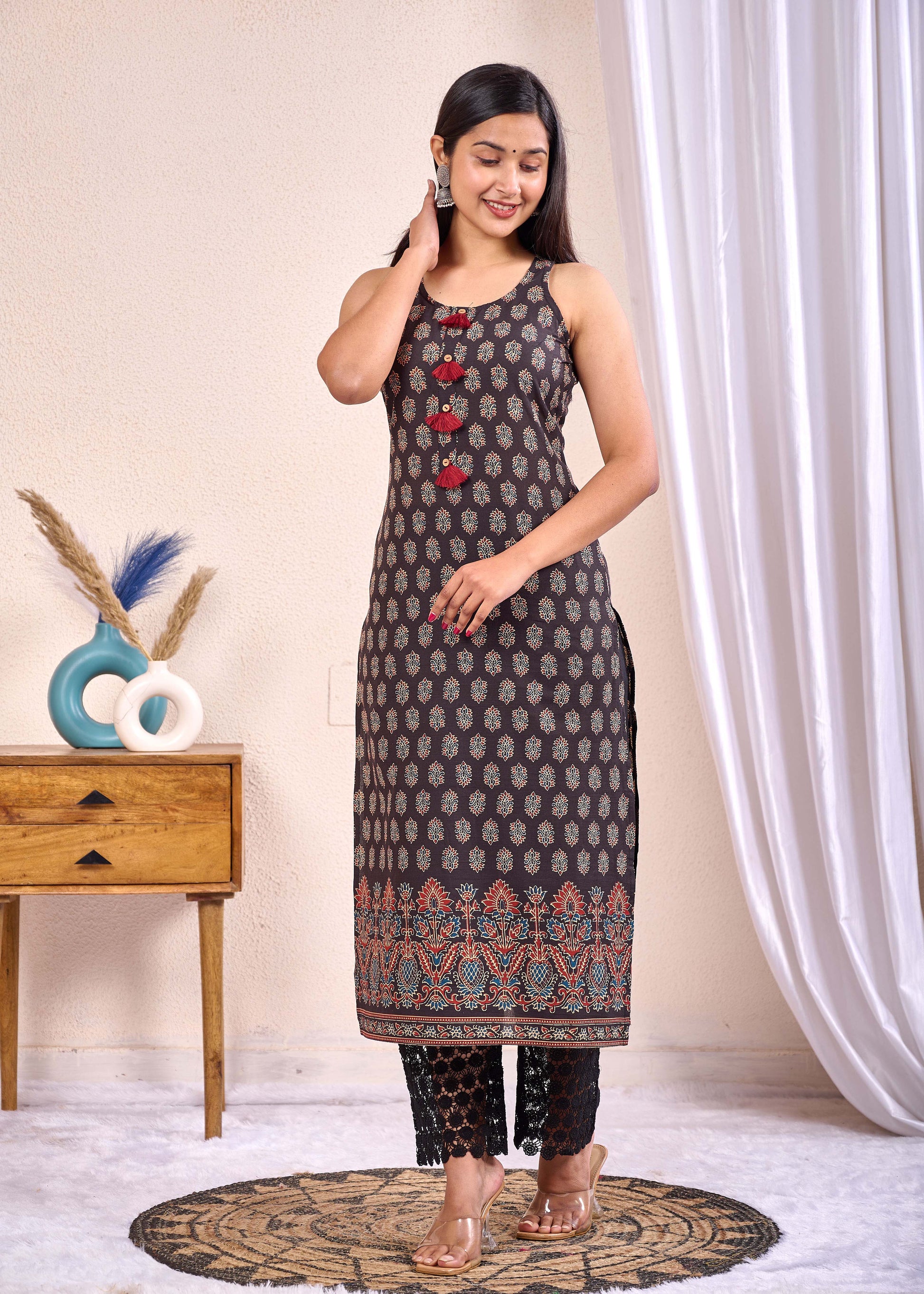Women Black Printed Straight Sleeveless Kurta | LASVINI - Redefining Indian Fashion with Elegance