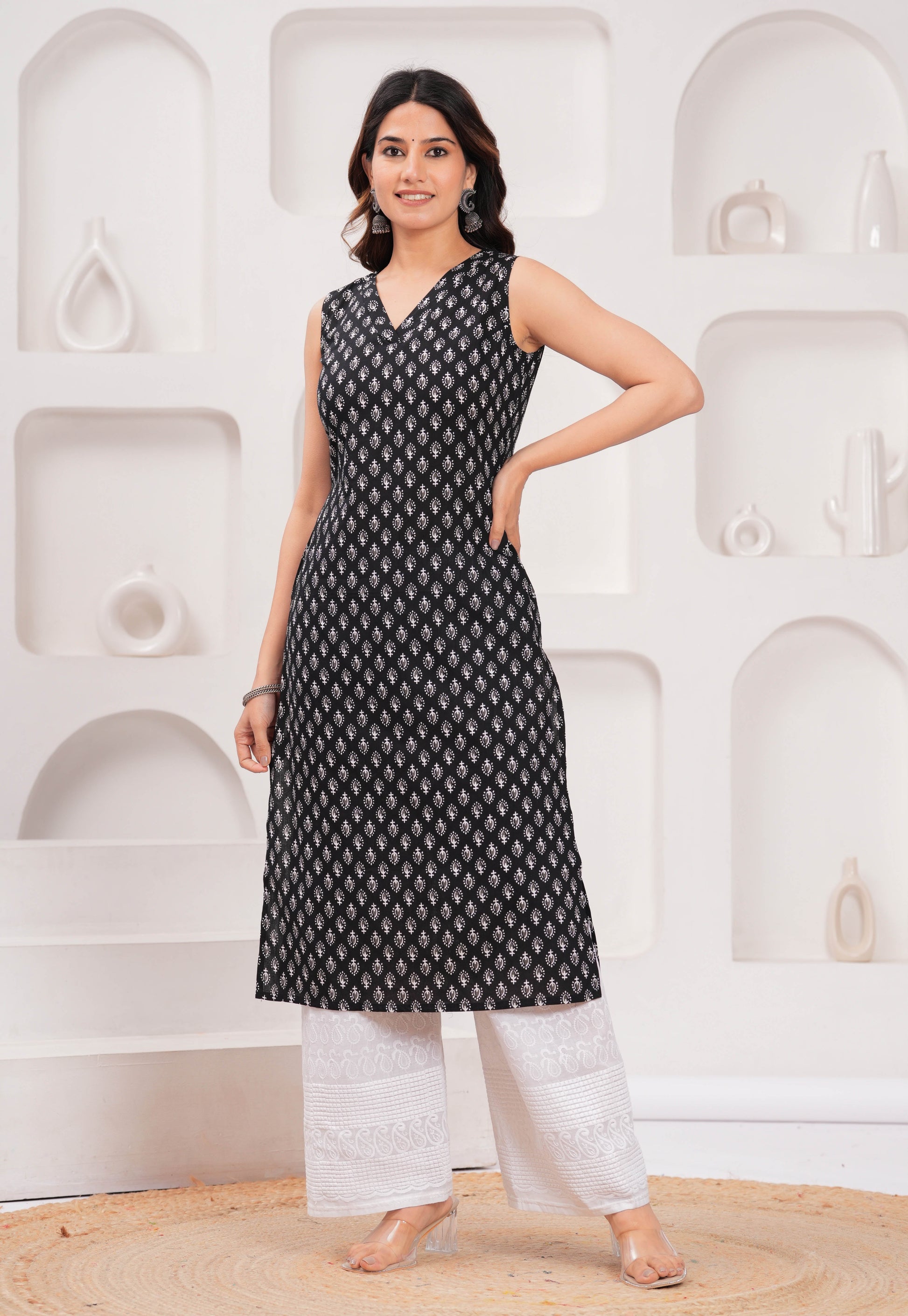Women Black Printed Straight Sleeveless Kurta | LASVINI - Redefining Indian Fashion with Elegance