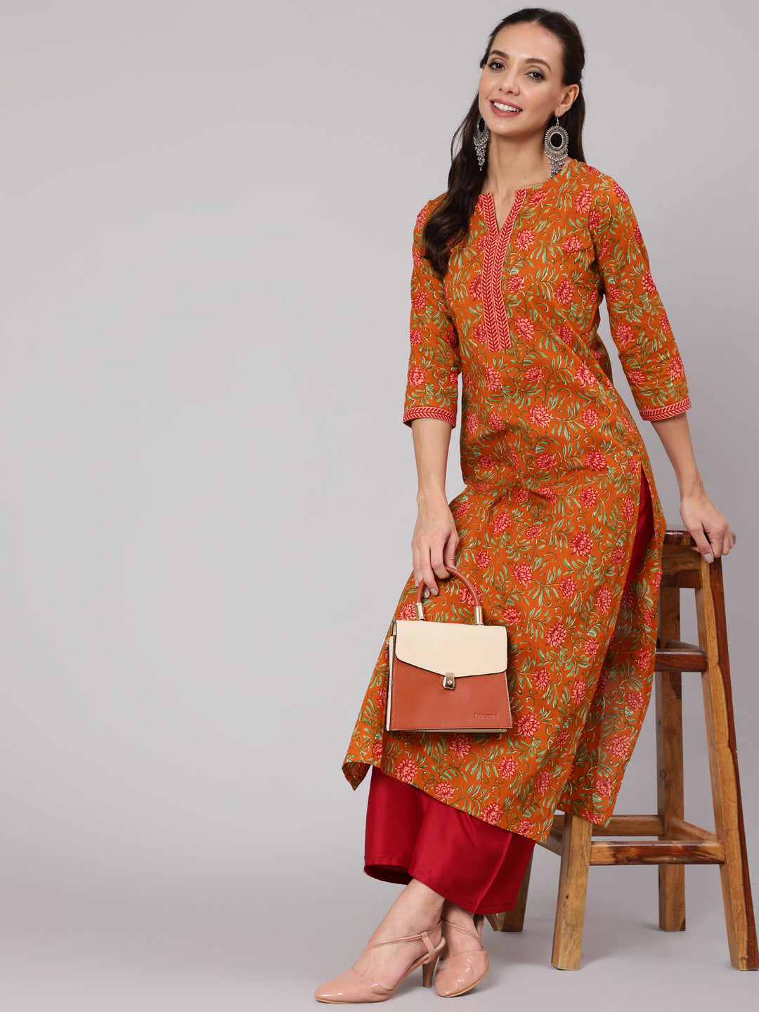 Women Mustard Floral Printed Straight Kurta With Three Quarter Sleeves | LASVINI - Redefining Indian Fashion with Elegance