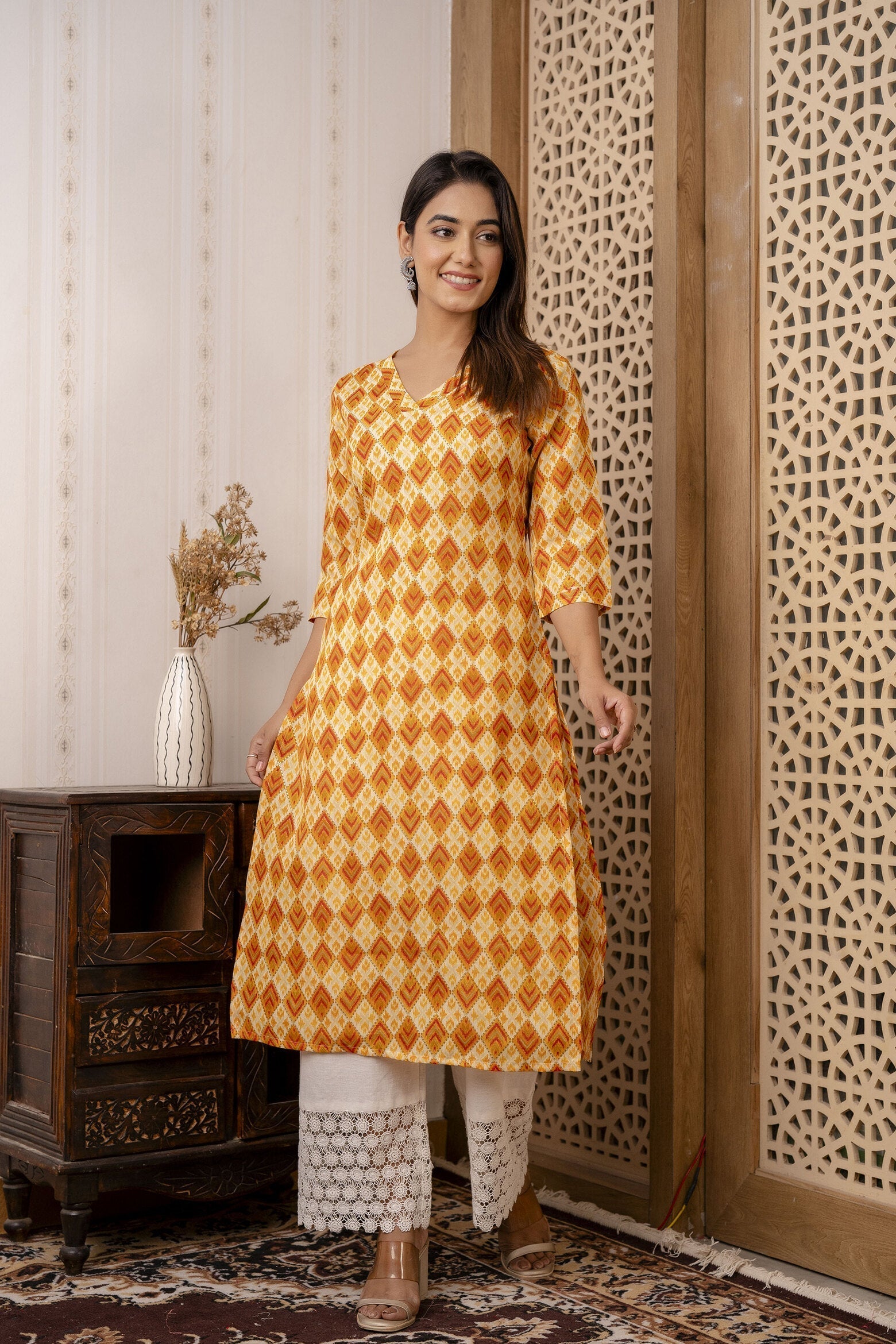 Women Yellow Printed Straight Kurta With Three Quarter Sleeves | LASVINI - Redefining Indian Fashion with Elegance
